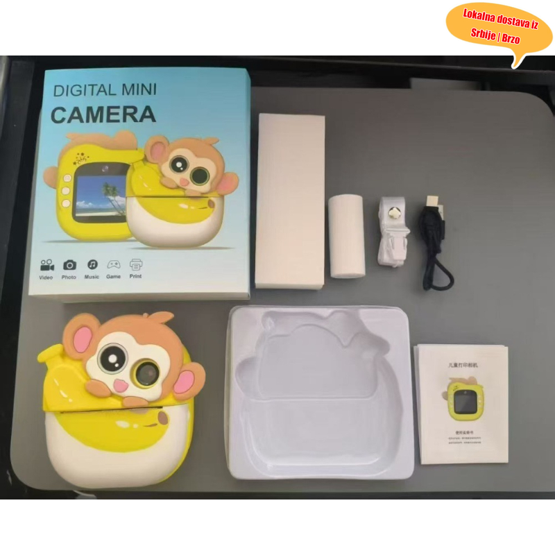 Digitalni fotoaparat dizajniran sa temom crtanih filmova, sa termalnim štampanjem, dvije HD leće i mogućnošću trenutnog štampanja.