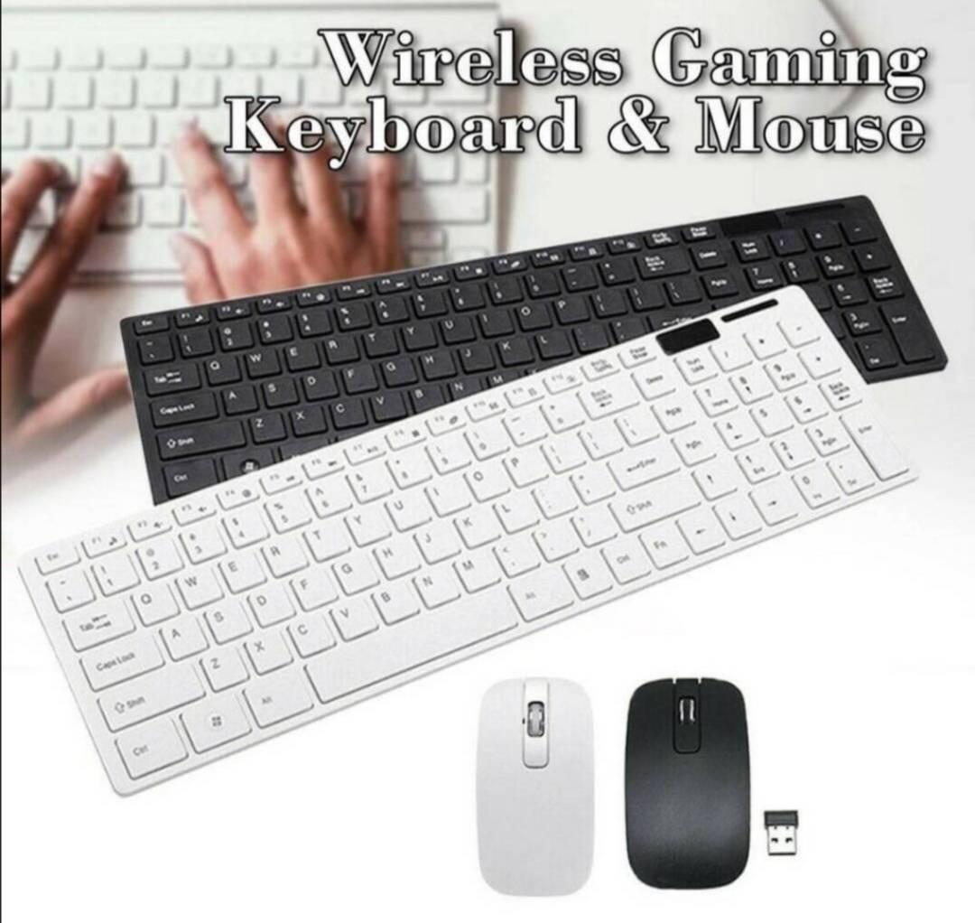 Crna i bela bezicna tastatura sa misom Crna i bela bezicna tastatura sa misom