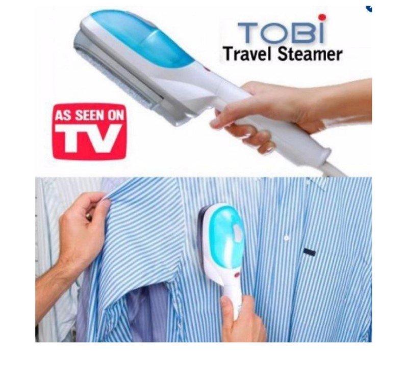 Tobi PEGLA na paru peglanje na vesalici Tobi PEGLA na paru peglanje na vesalici